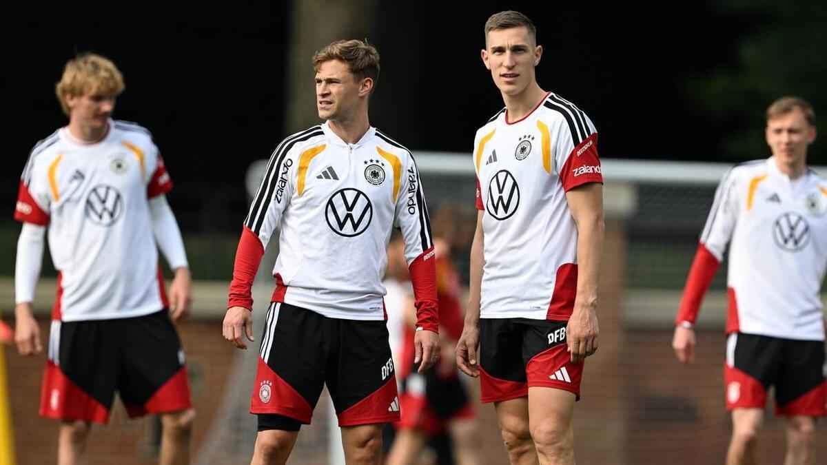 Dfb-stars überraschen fans mit busfahrt zur wm: kimmich schenkt reise!