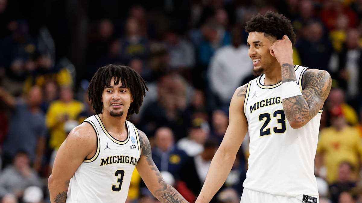Die huskies kämpfen, doch michigan hält stand