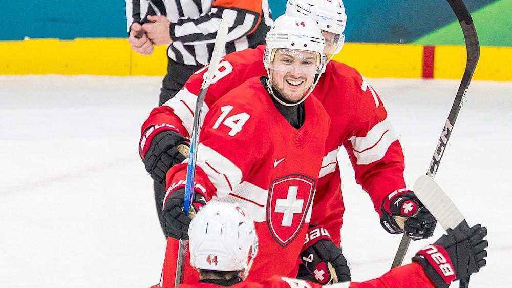 Schweizer eishockey-team trotzt widrigkeiten und sichert sich platz zwei in der gruppe a